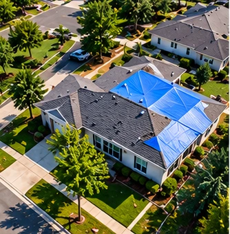 Illustrative aerial view of a roof covered with protective tarps